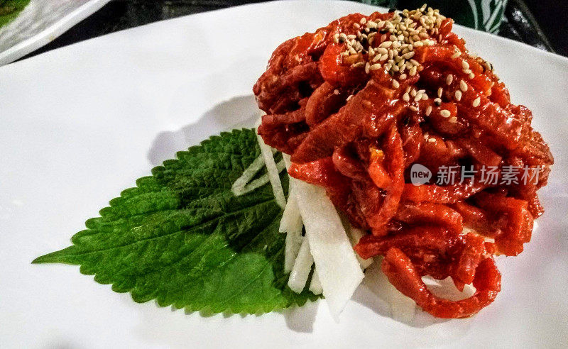 Yukhoe (Korean:生拌肉(juk)) is a raw meat dish in Korean cuisine